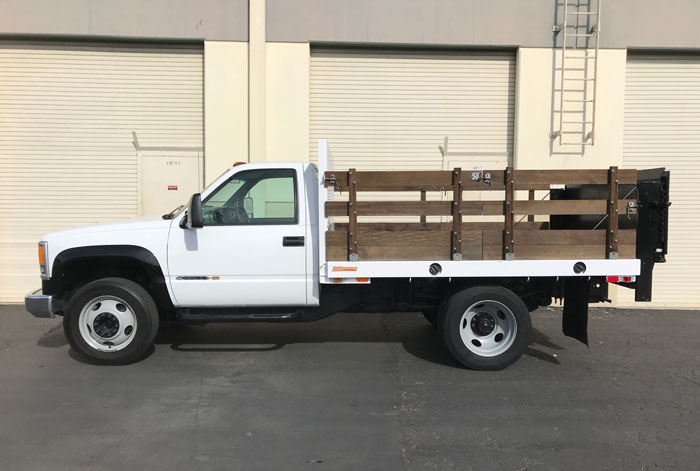 2002 Chevy C3500 HD Stakebed  - Driver Side