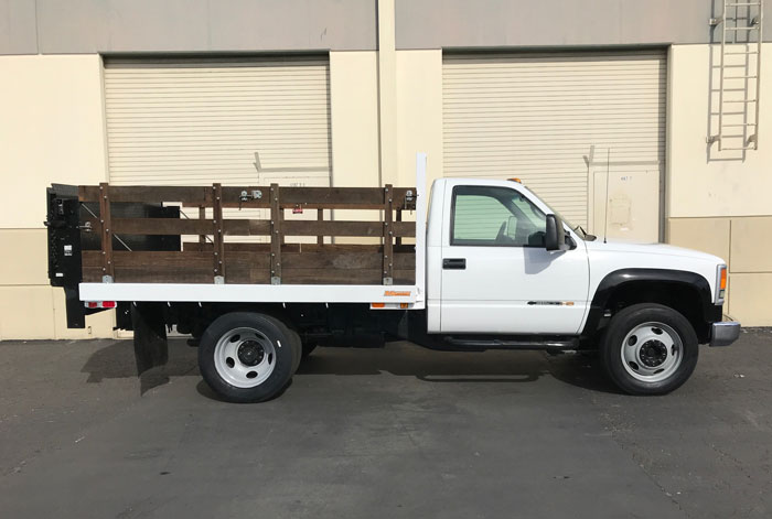 2002 Chevy C3500 HD Stakebed  - Passenger Side