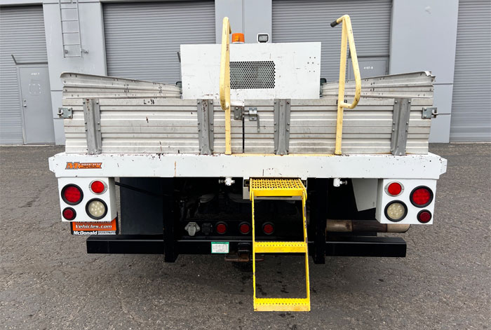 2012 Ford F-550 XLT 12' Stakebed Truck - Rear View 1 - Steps/Handholds